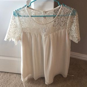 Cream colored maternity shirt